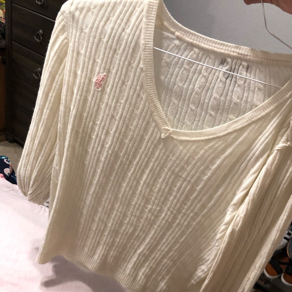 white polo sweater